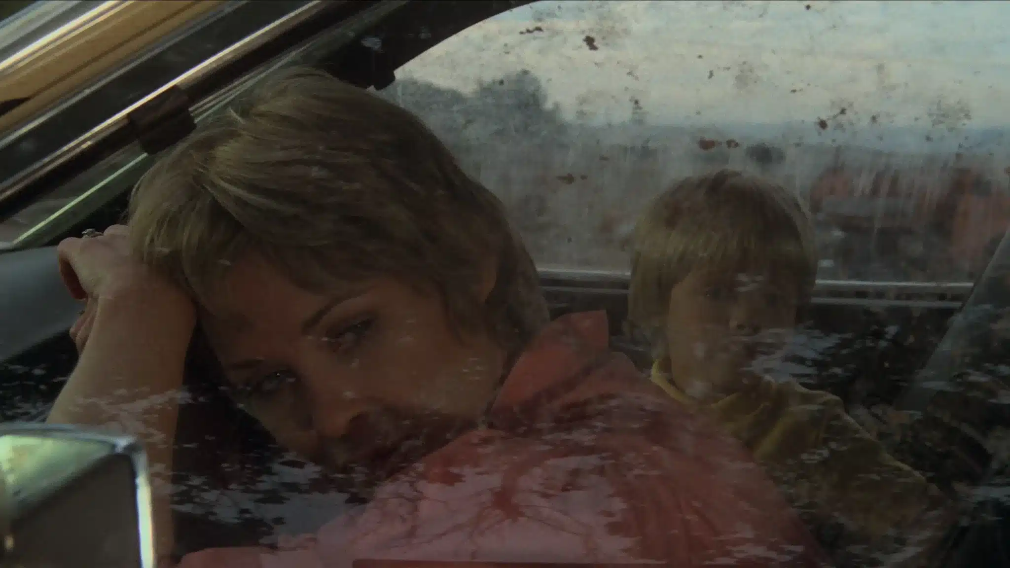 45 Years of Cujo - Dee Wallace as Donna stares out the windows of the car as she contemplates how to save her son.