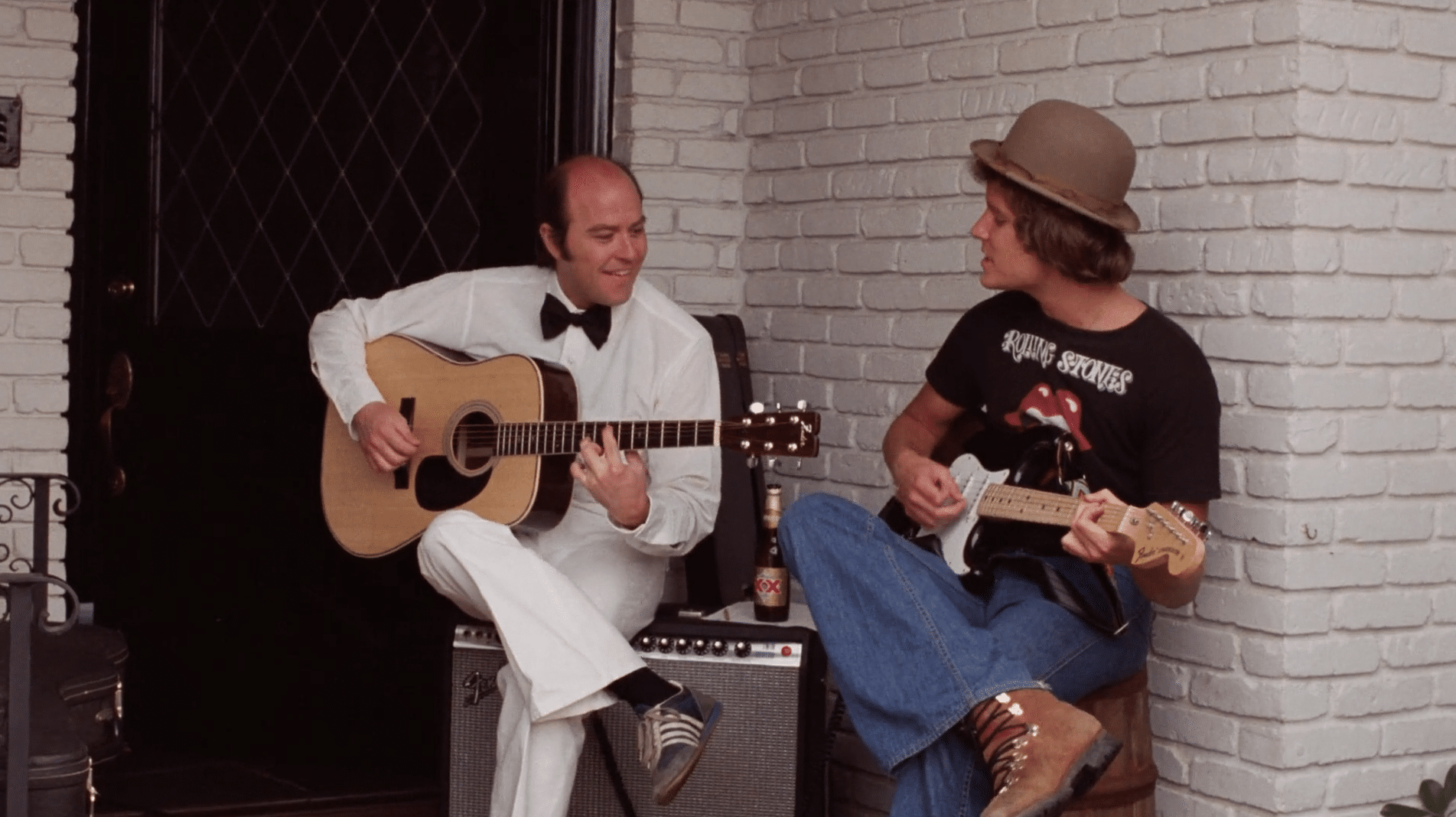 Reggie Bannister playing with Bill Thornbury on the porch in Phantasm